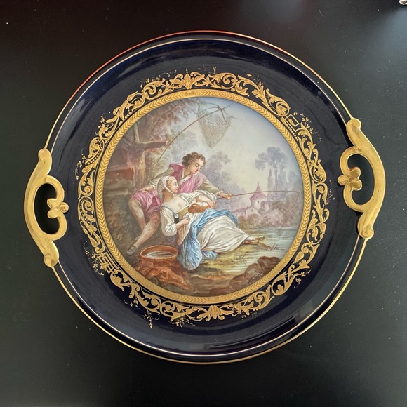 Vintage and elegant porcelain plate with gold decoration..
